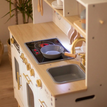 Détail du évier et de la cuisson de la cuisine XXL en bois